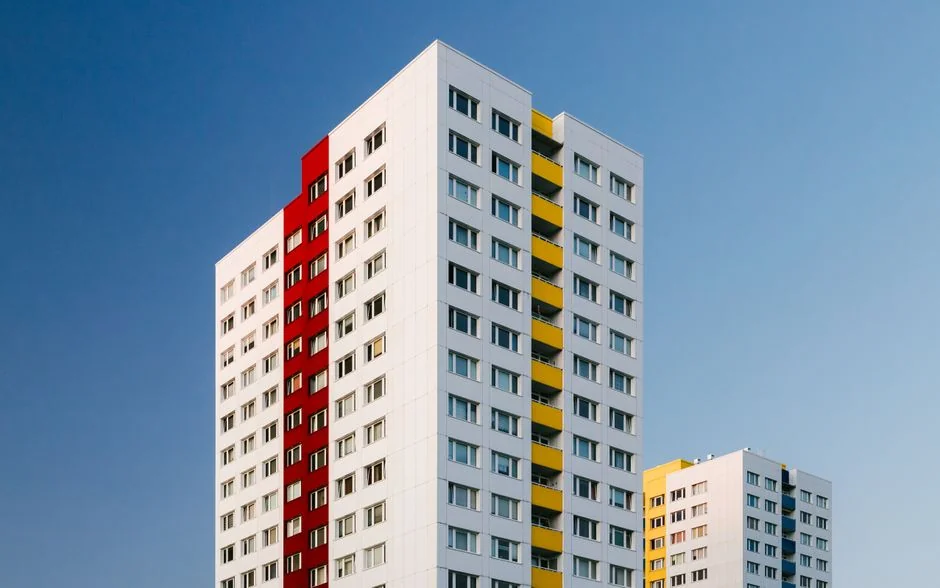 heros-img Window cleaner works on a high-rise glass building, ensuring spotless results.